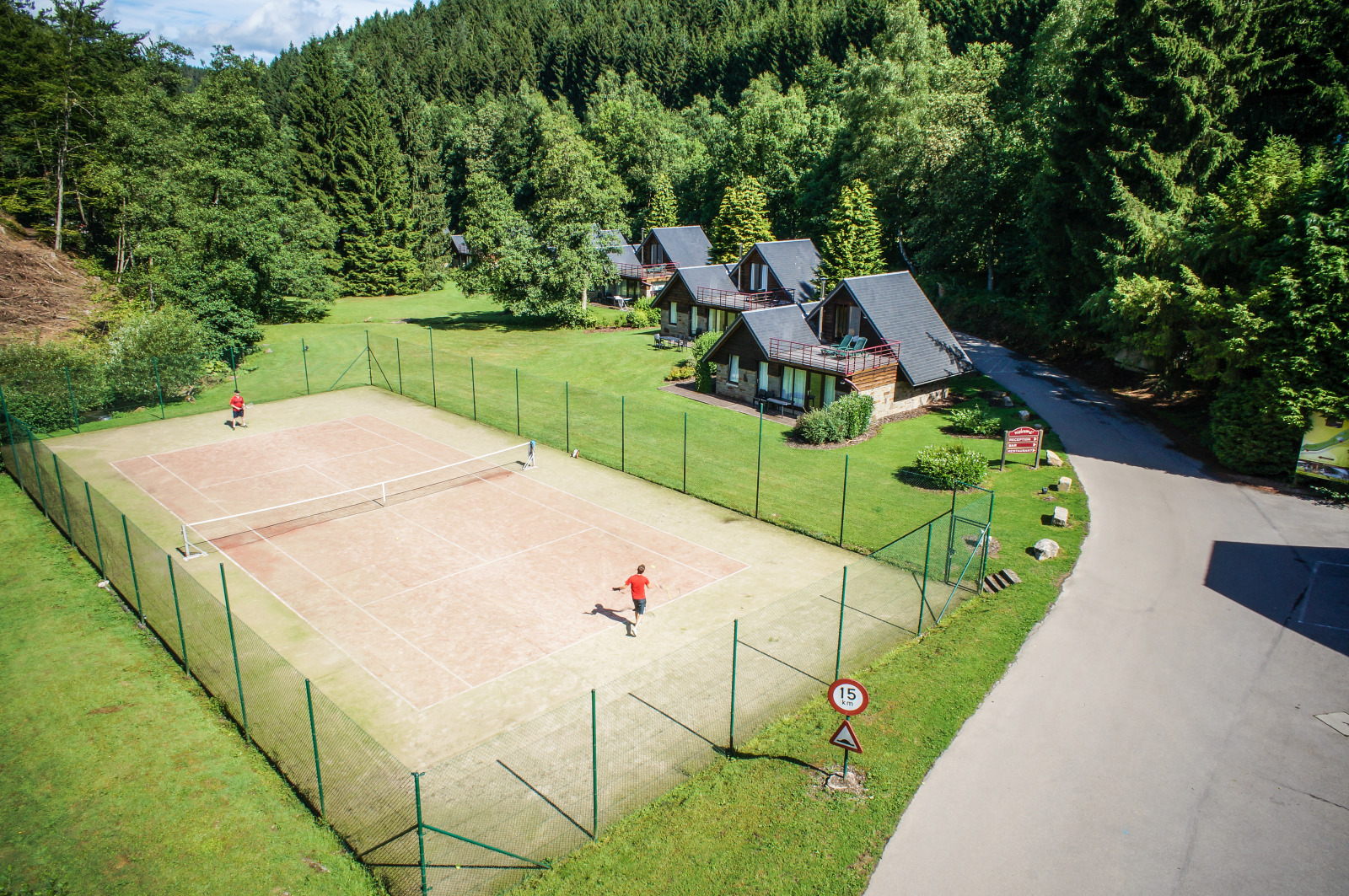 Aerial view of the tennis court of the Val d'Arimont holiday village in Malmedy
