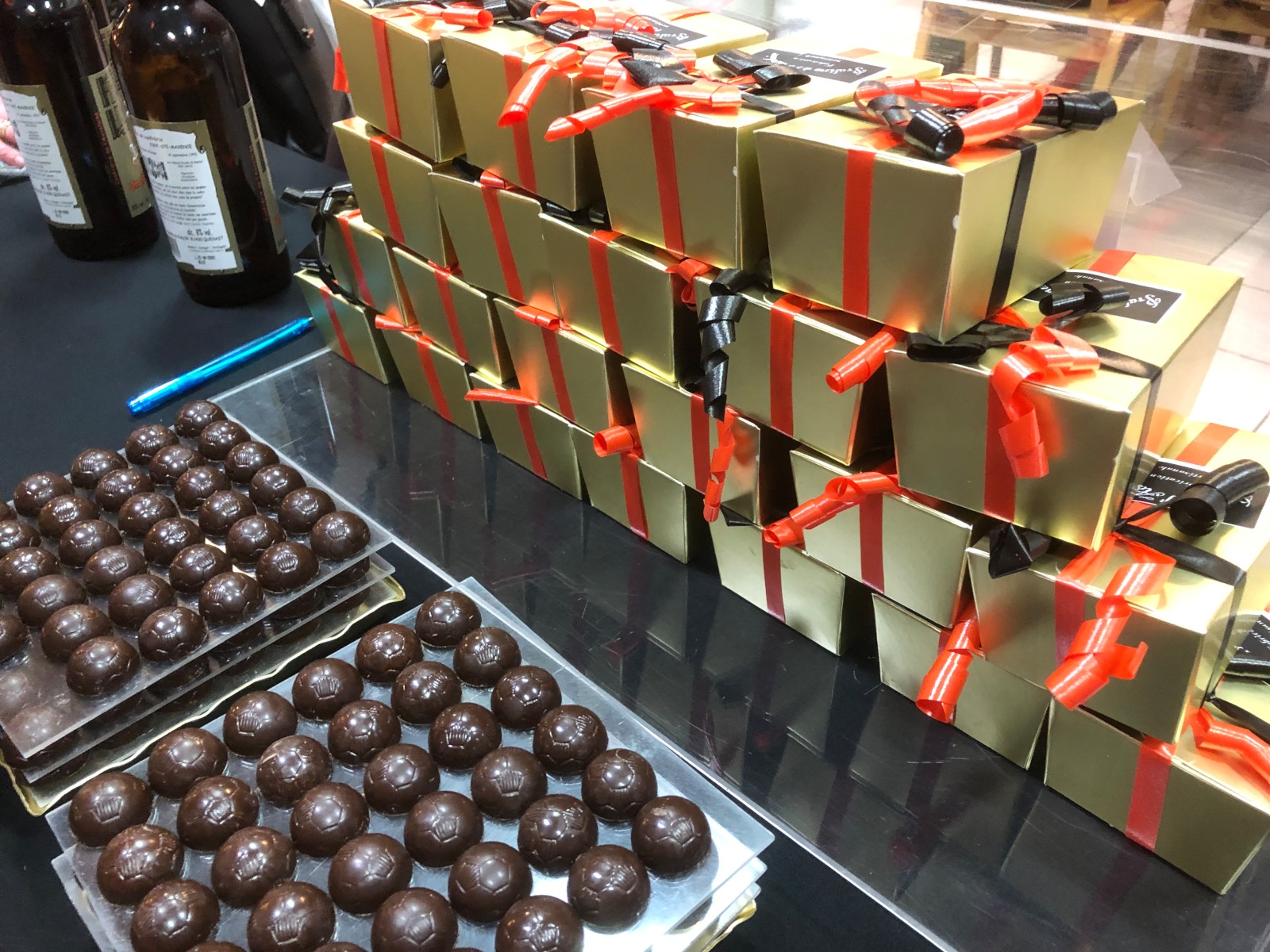 Pralines and ballotins placed on a table for tasting