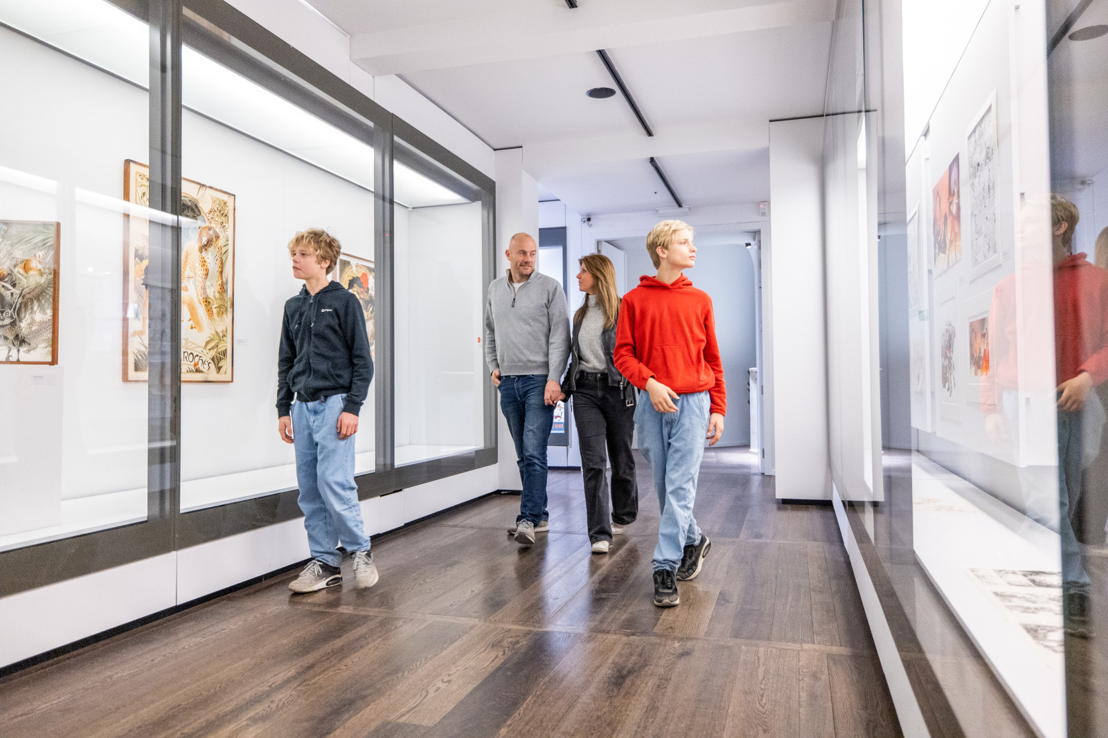 A family looks at works at the Grand Curtius museum in Liège
