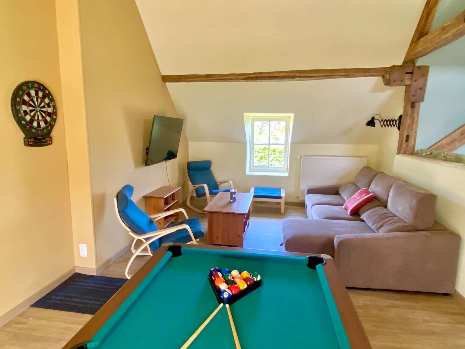 Games room with billiards and darts - lounge with a smart TV at the La Demoiselle ô bois rural gîte in Seloignes