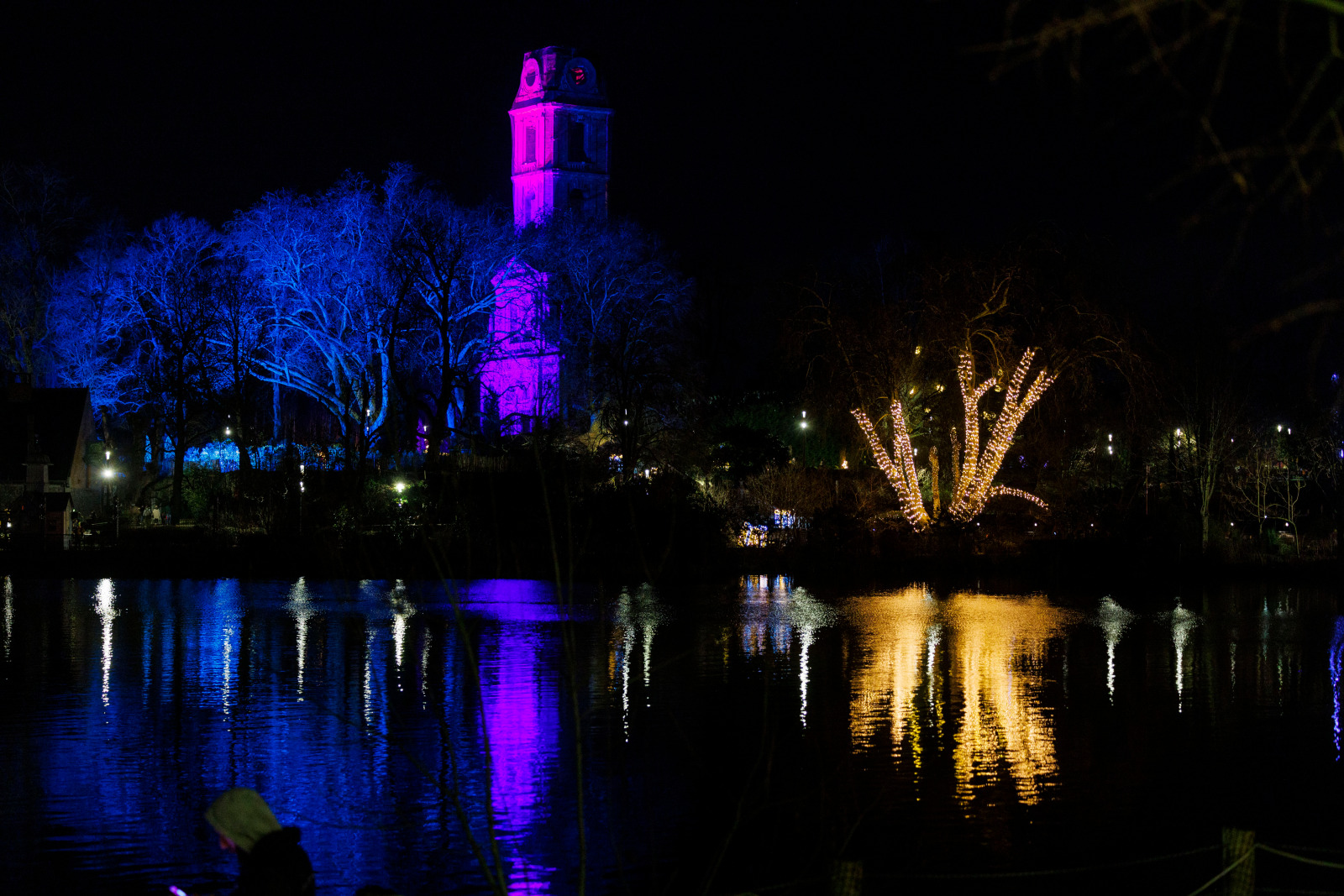 Illuminated Cambron Tower, by the lake
