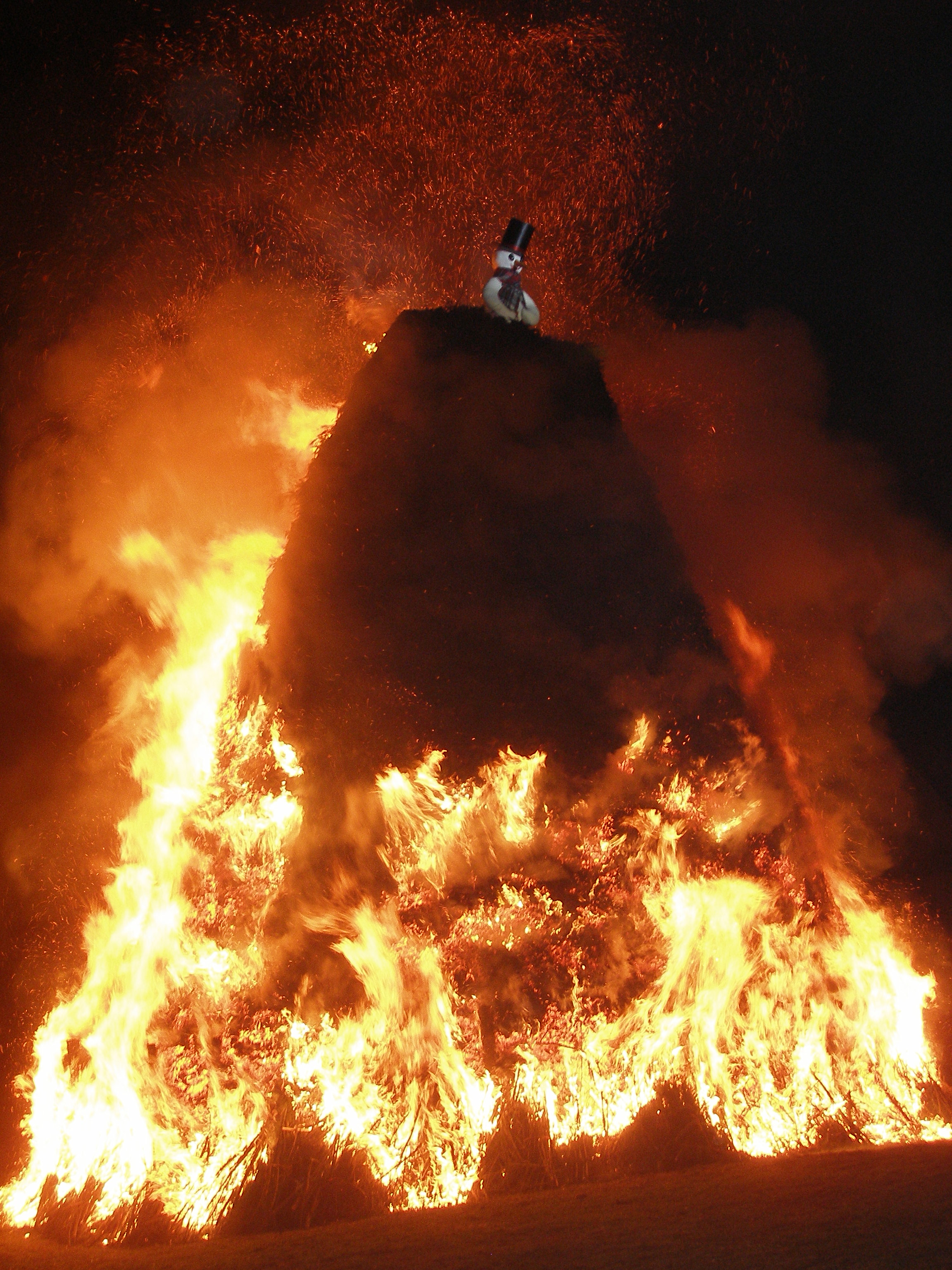 Snowman on top of the burning pyre