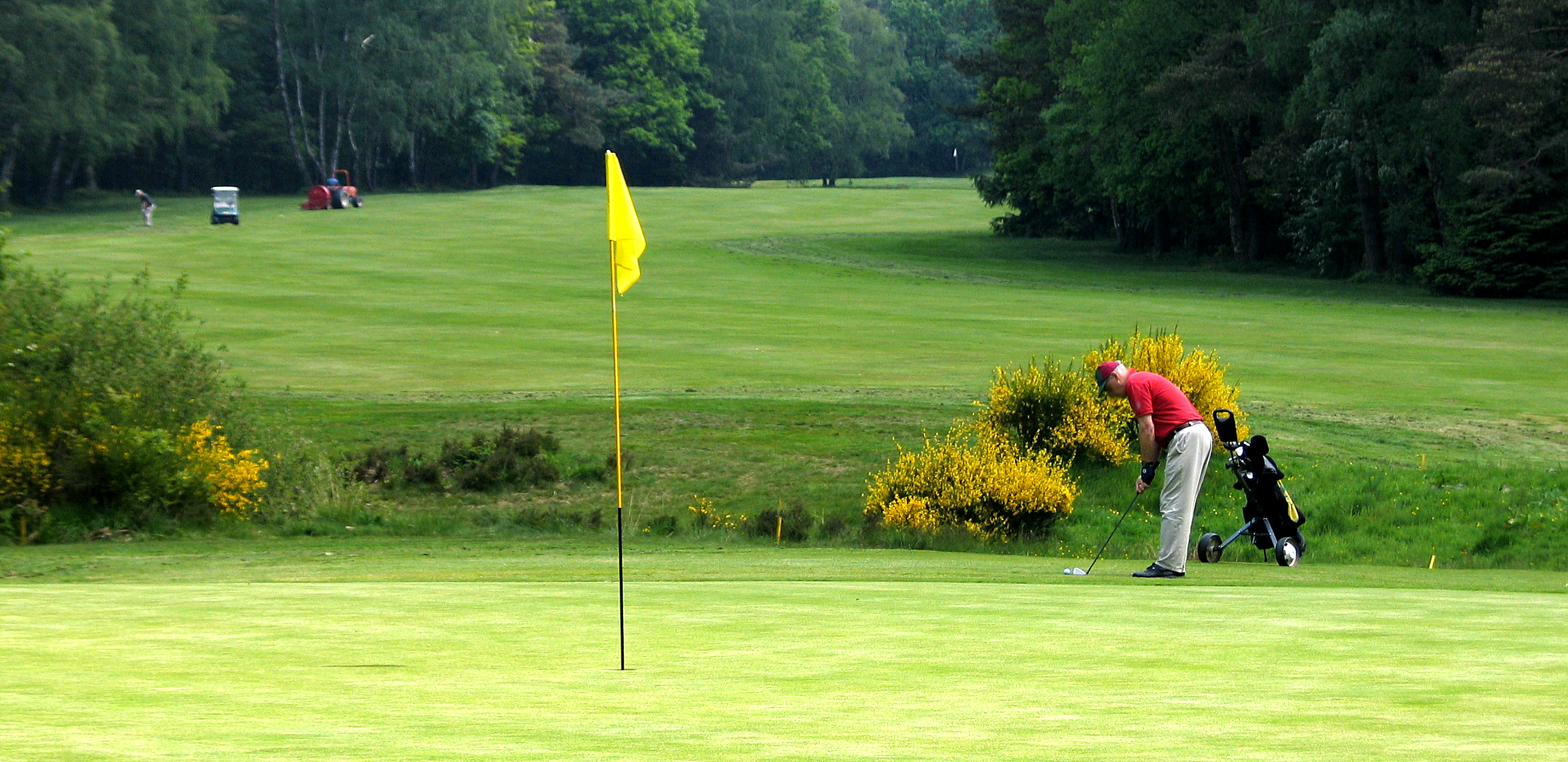 Man playing on a golf course in Spa