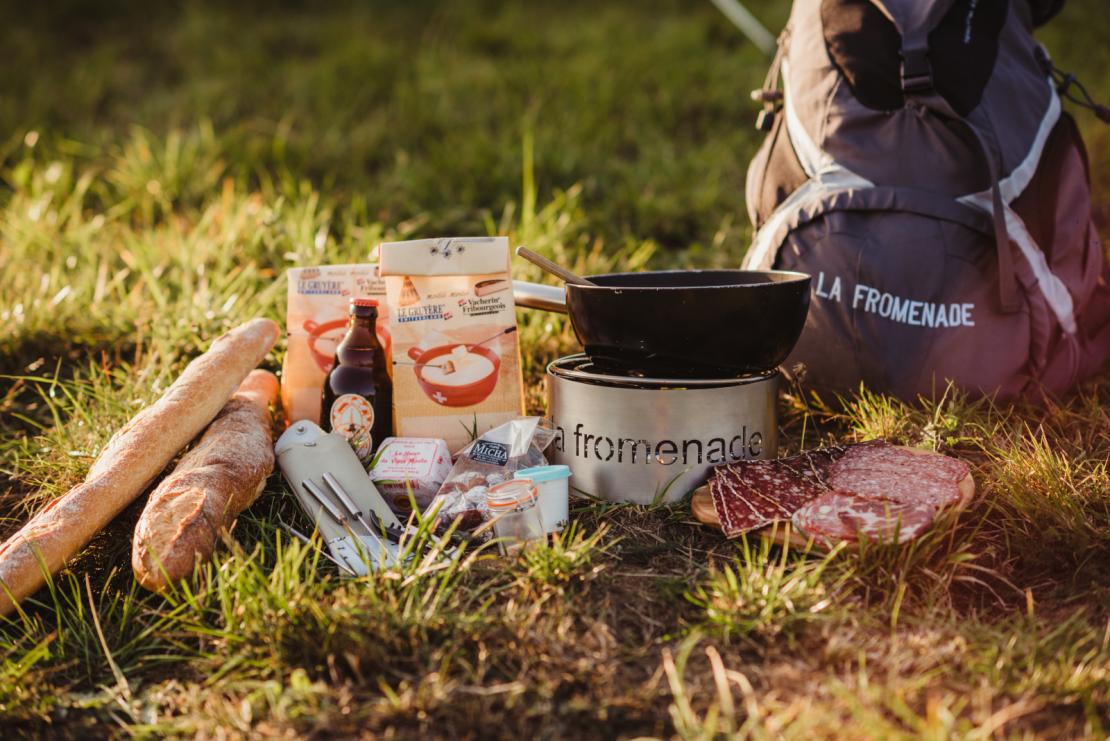 Picnic with products by La Fromenade in a field