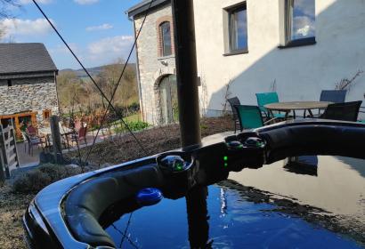 Jacuzzi of Le Petit Rameau furnished holiday home in Vielsalm