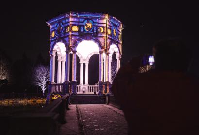 Enghien Park Pavilion lit with image projections and color plays