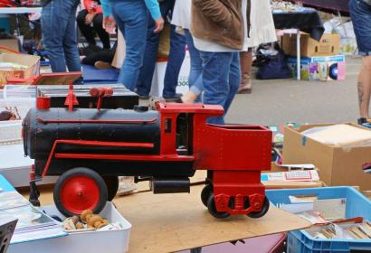 A toy steam train on a stall