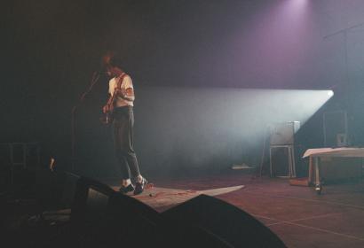 Singer-guitarist on stage