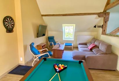 Games room with billiards and darts - lounge with a smart TV at the La Demoiselle ô bois rural gîte in Seloignes