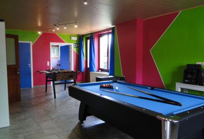 Table football and billiards at La Meliraude, a rural gîte in Porcheresse