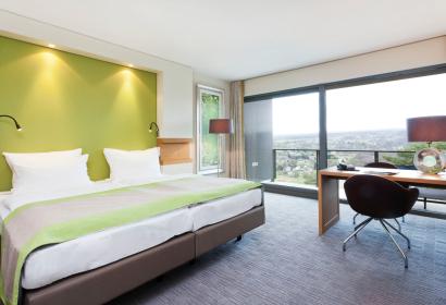 Chambre avec grande baie vitrée