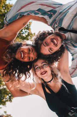 A group of young friends photographed from below in summer in Namur